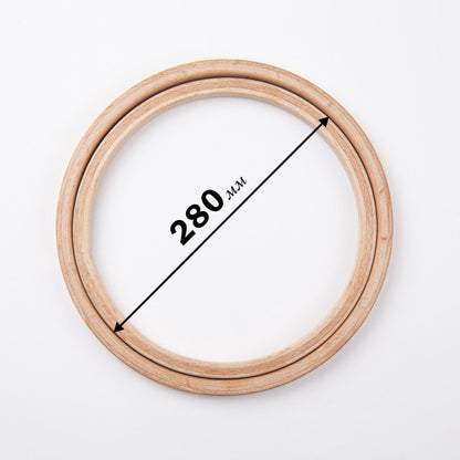 Beech embroidery hoop with depth, screwless mechanism.