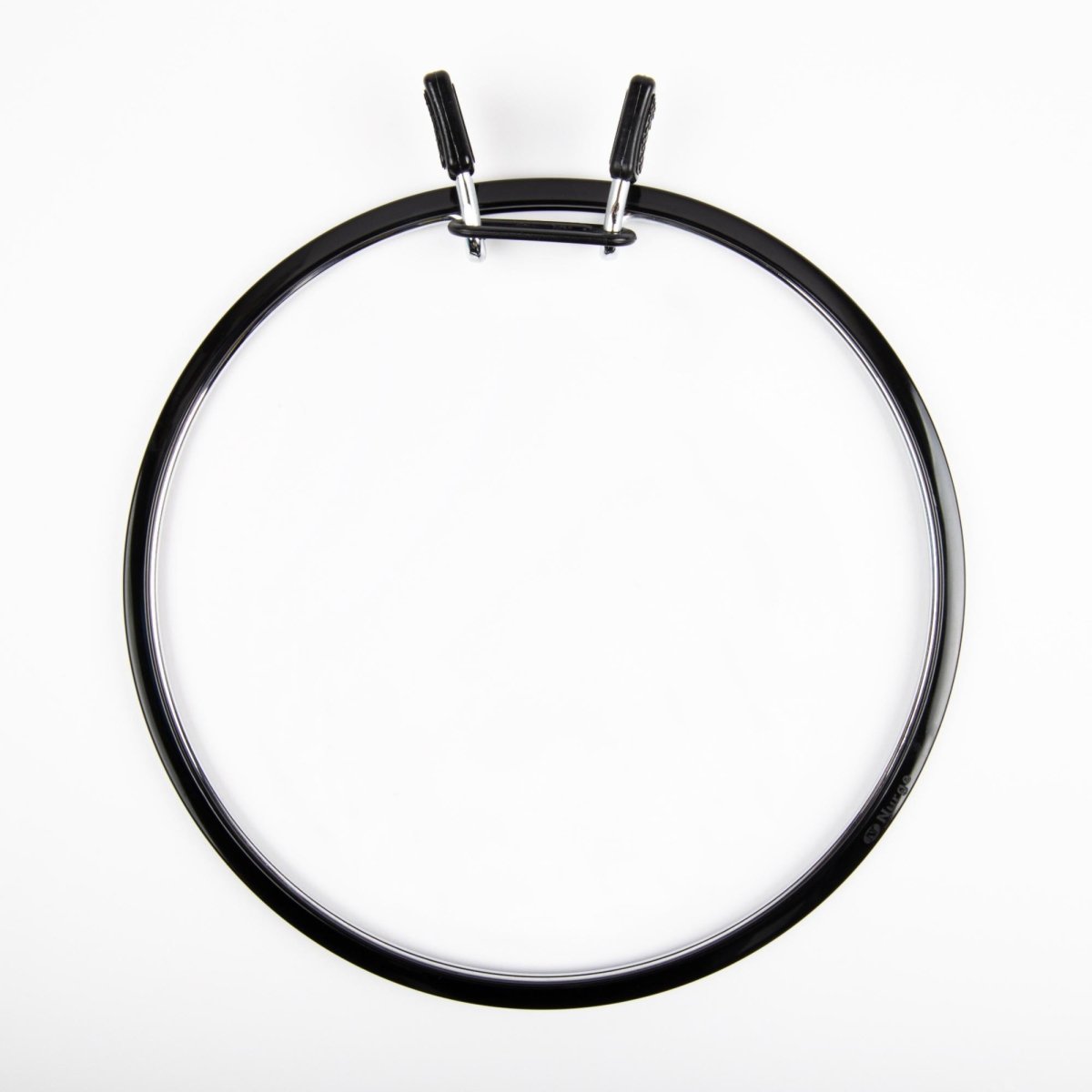 Spring tension hoop for embroidery or sewing by Nurge.