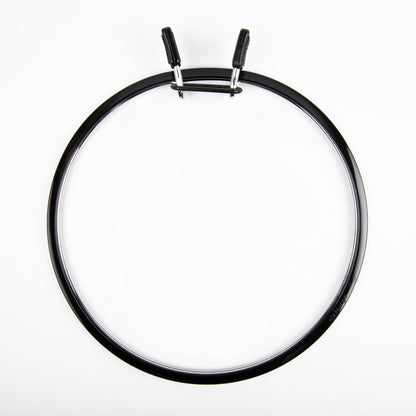 Spring tension hoop for embroidery or sewing by Nurge.