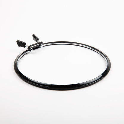 Nurge spring tension embroidery hoop for precise work.