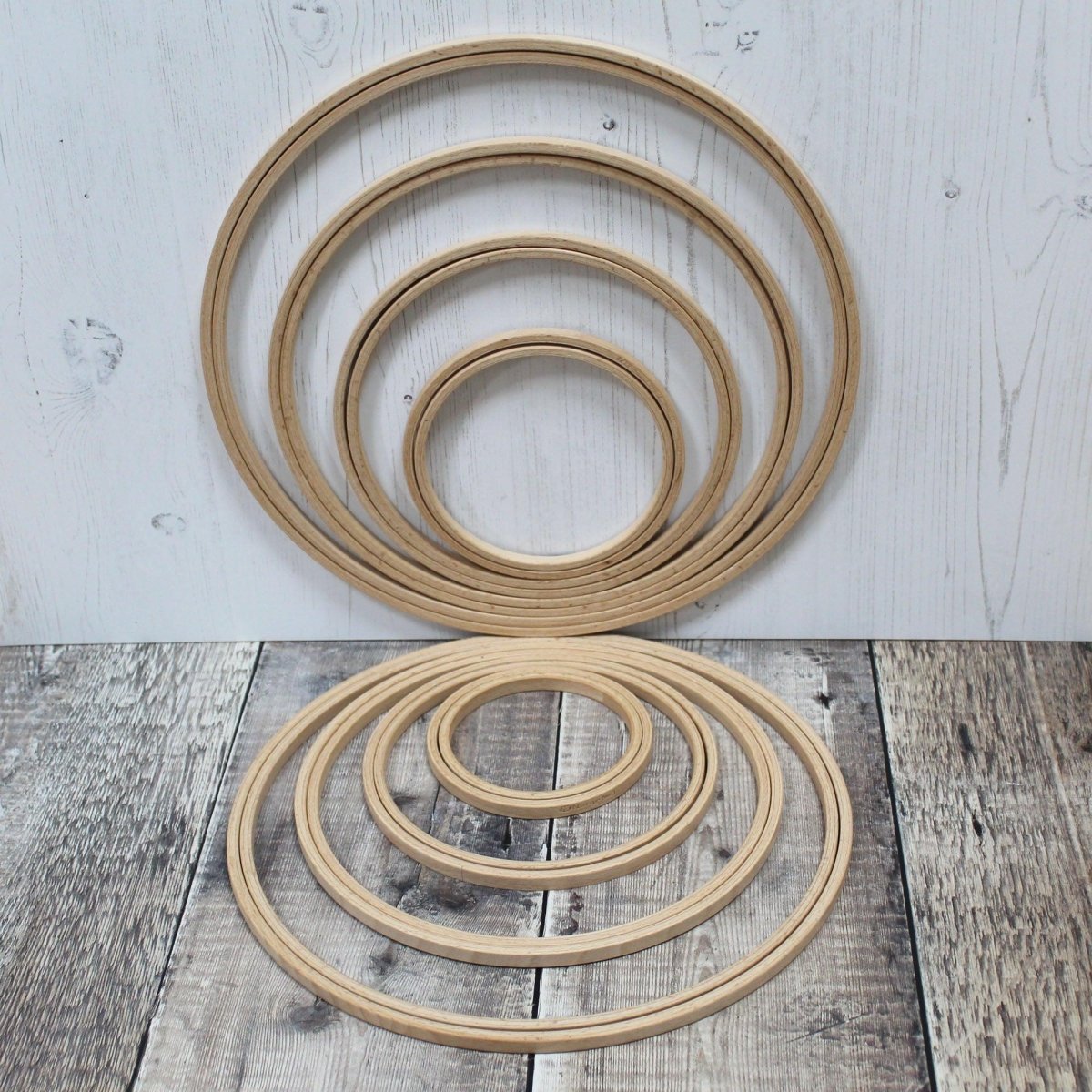 Polished beech embroidery hoop, screw-free depth adjustment.