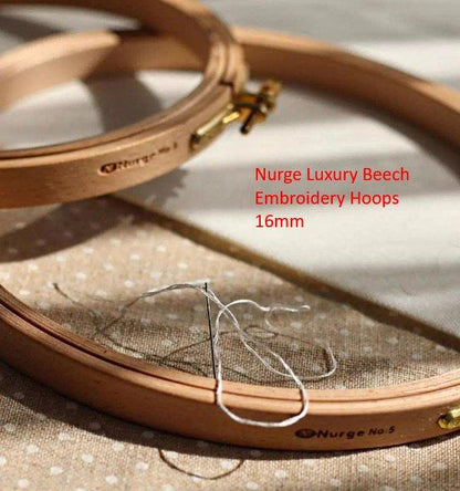 Nurge embroidery hoop with depth screw.