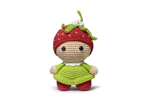 Strawberry amigurumi with tiny heart charm.