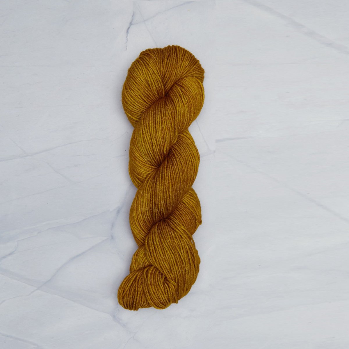 Spicy Mustard Symfonie yarn, hand-dyed Superwash Merino.