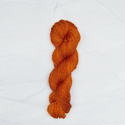 Burnt Sugar Symfonie yarn, hand-dyed Superwash Merino.