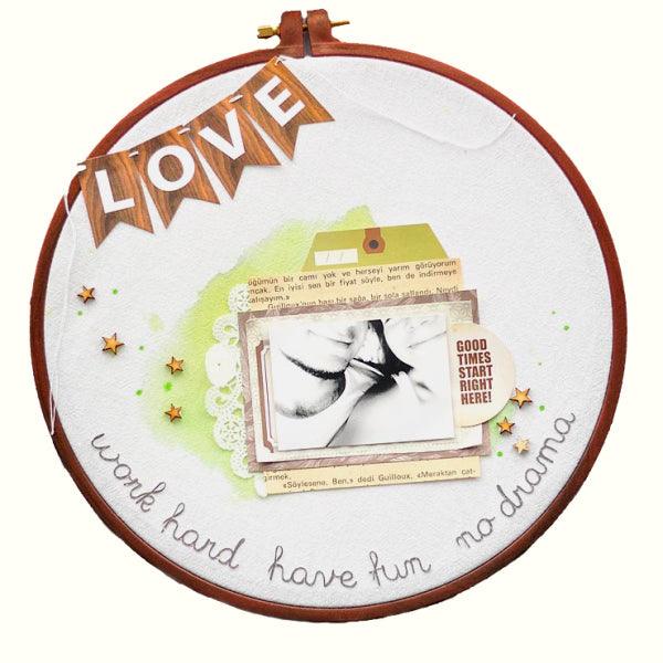 Plastic embroidery hoop with screw and wood grain effect, Nurge.