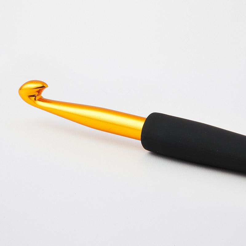 Sleek KnitPro Gold Hook with a comfortable black handle.