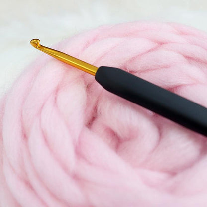 Gold KnitPro Crochet Hook with a distinctive black handle.