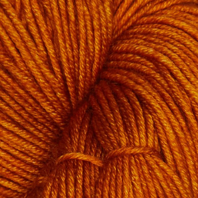 Semisolid Burnt Sugar Superwash Merino yarn.