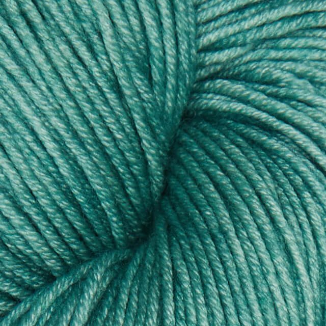 Semisolid Sage Superwash Merino yarn.